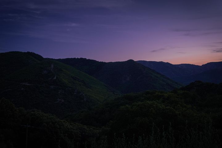 An early sunrise with a purple sky